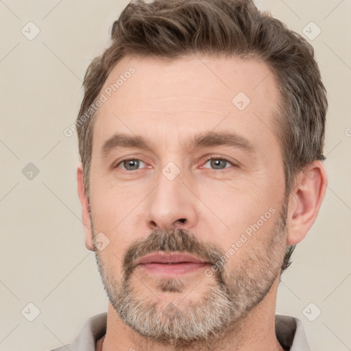 Neutral white adult male with short  brown hair and brown eyes