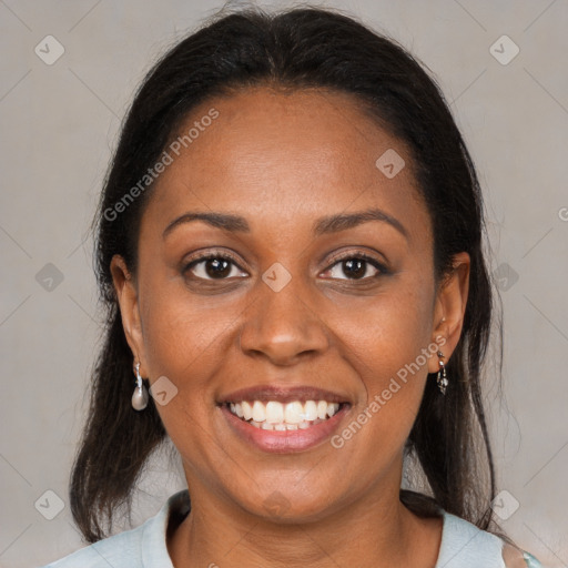 Joyful black young-adult female with medium  brown hair and brown eyes