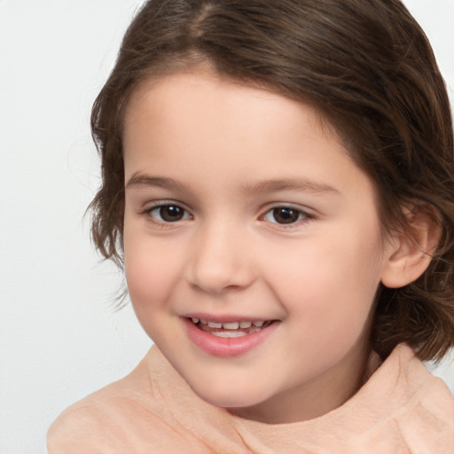 Joyful white child female with medium  brown hair and brown eyes