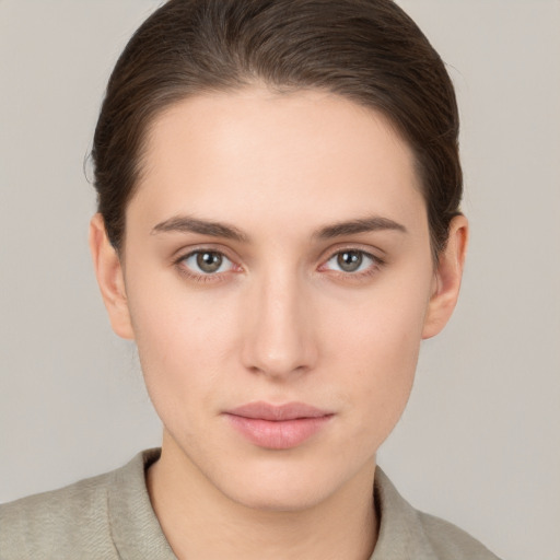 Neutral white young-adult female with short  brown hair and brown eyes