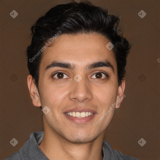 Joyful white young-adult male with short  black hair and brown eyes