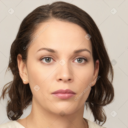 Neutral white young-adult female with medium  brown hair and brown eyes