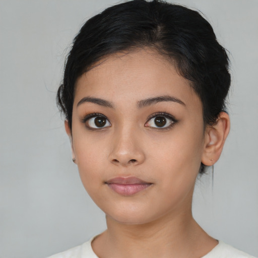 Neutral latino young-adult female with short  brown hair and brown eyes