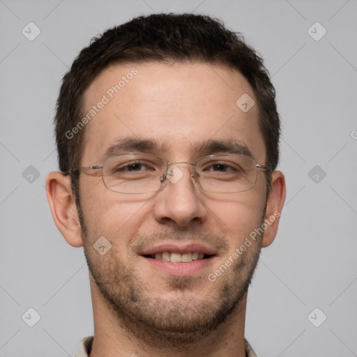 Joyful white adult male with short  brown hair and brown eyes