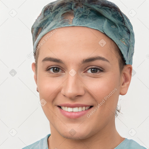 Joyful white young-adult female with short  brown hair and brown eyes