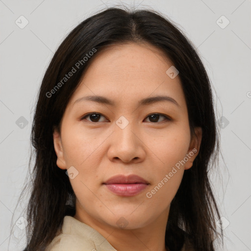 Joyful asian young-adult female with long  brown hair and brown eyes