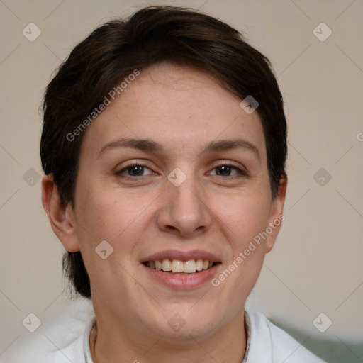 Joyful white adult female with short  brown hair and brown eyes