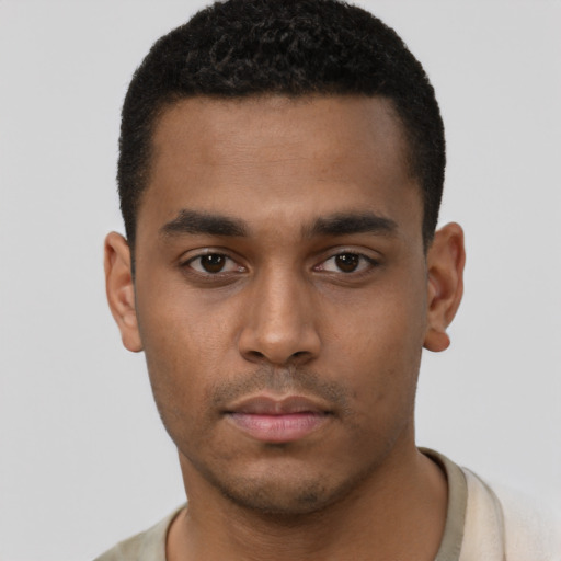 Neutral black young-adult male with short  black hair and brown eyes