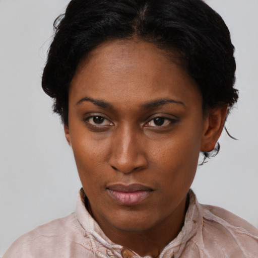Neutral latino young-adult female with short  black hair and brown eyes