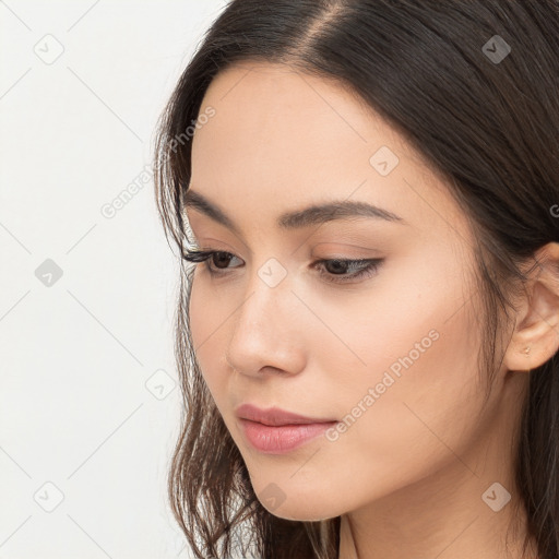 Neutral white young-adult female with long  brown hair and brown eyes