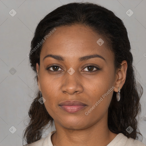 Joyful black young-adult female with medium  black hair and brown eyes