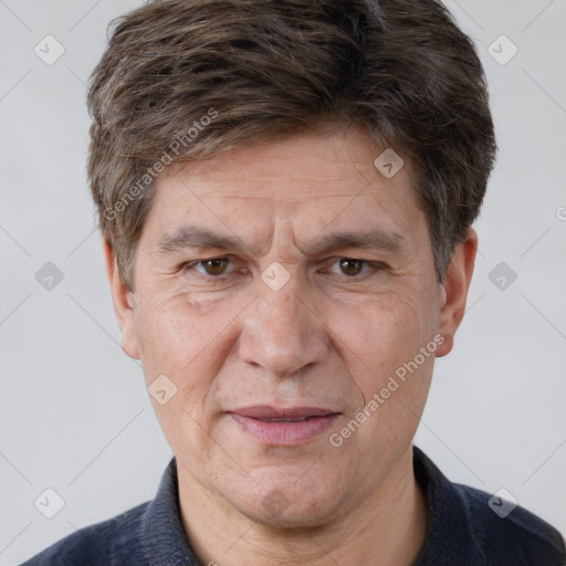 Joyful white middle-aged male with short  brown hair and brown eyes