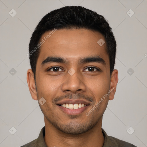 Joyful latino young-adult male with short  black hair and brown eyes