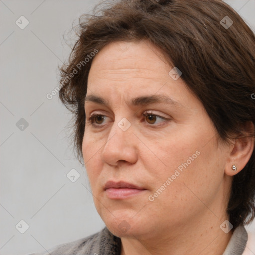 Neutral white adult female with medium  brown hair and brown eyes