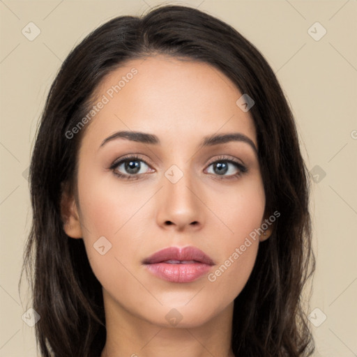 Neutral white young-adult female with long  brown hair and brown eyes