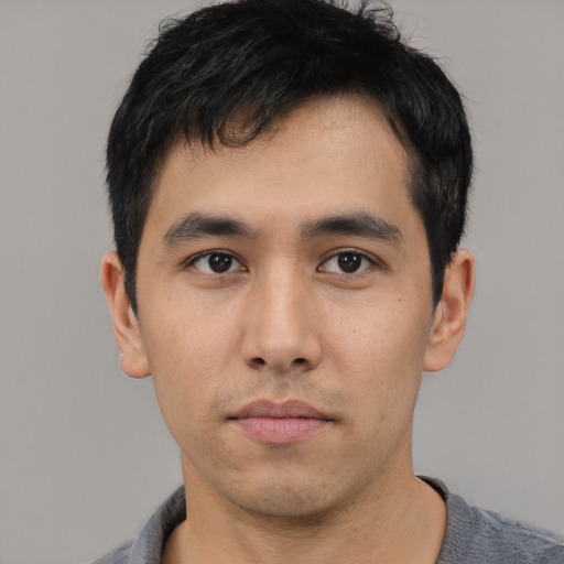Neutral asian young-adult male with short  black hair and brown eyes