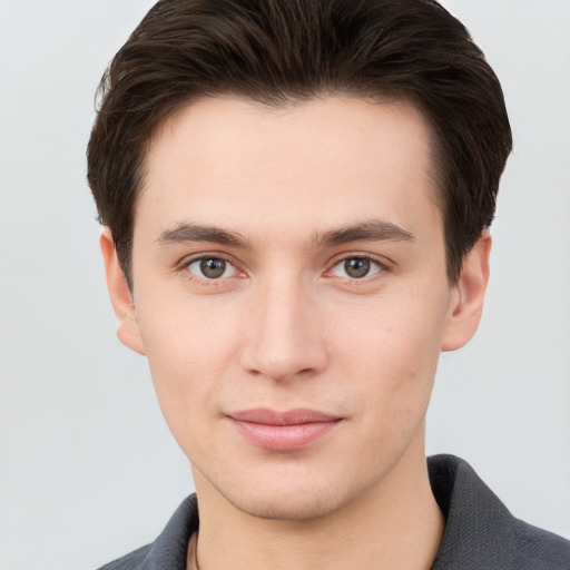 Neutral white young-adult male with short  brown hair and brown eyes