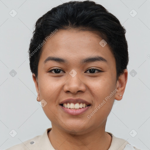 Joyful latino young-adult female with short  brown hair and brown eyes