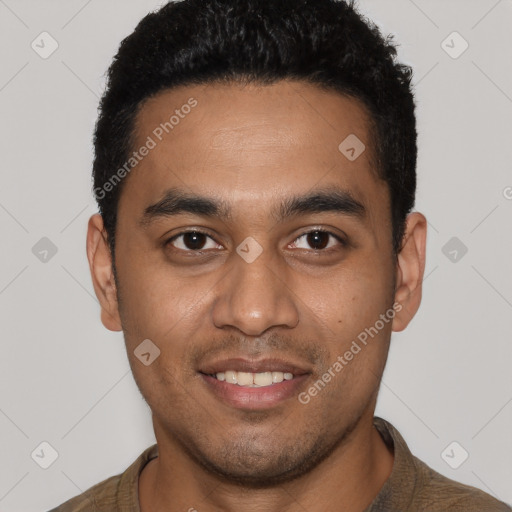 Joyful latino young-adult male with short  black hair and brown eyes