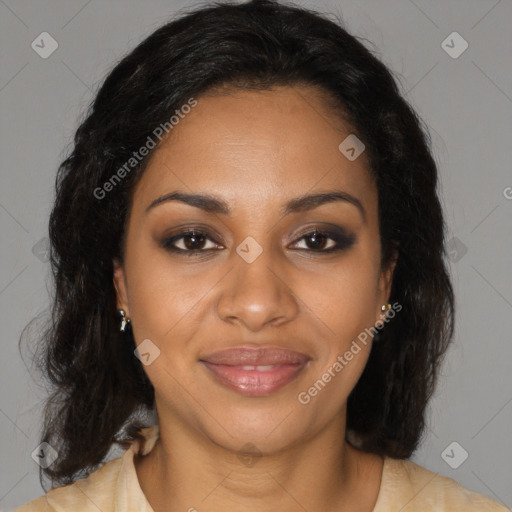 Joyful black young-adult female with long  brown hair and brown eyes