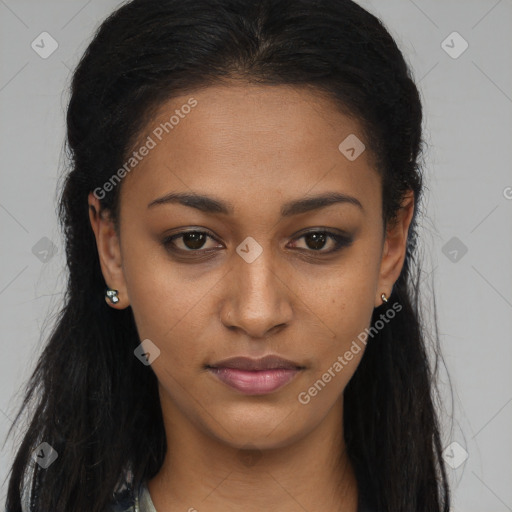 Joyful black young-adult female with long  brown hair and brown eyes