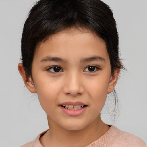 Joyful asian child female with medium  brown hair and brown eyes