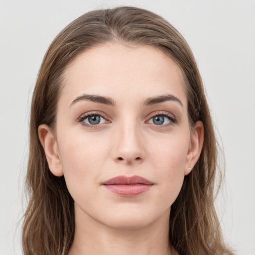 Neutral white young-adult female with long  brown hair and grey eyes