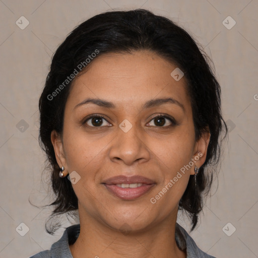 Joyful latino young-adult female with medium  brown hair and brown eyes