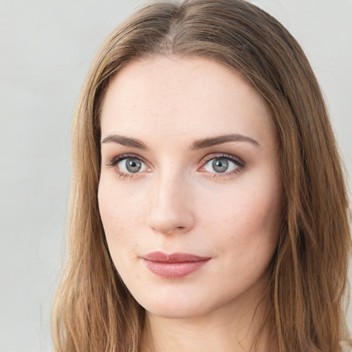 Neutral white young-adult female with long  brown hair and green eyes