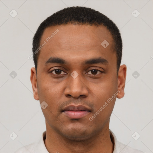 Neutral black young-adult male with short  black hair and brown eyes