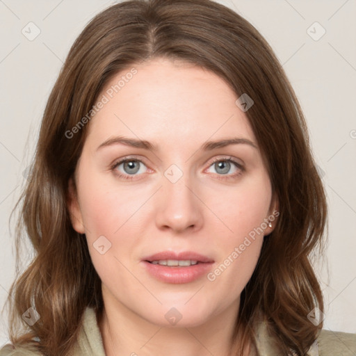 Joyful white young-adult female with medium  brown hair and green eyes