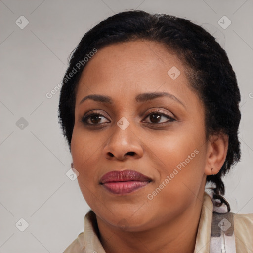 Joyful black young-adult female with medium  black hair and brown eyes