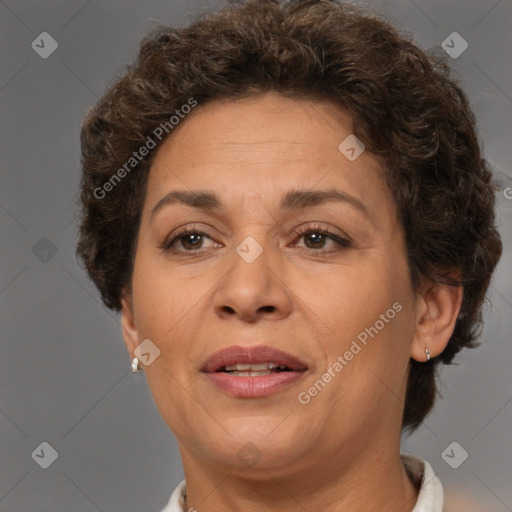 Joyful white adult female with short  brown hair and brown eyes