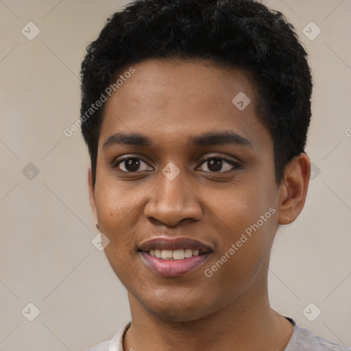 Joyful black young-adult male with short  black hair and brown eyes