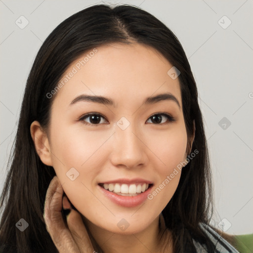 Joyful white young-adult female with long  brown hair and brown eyes