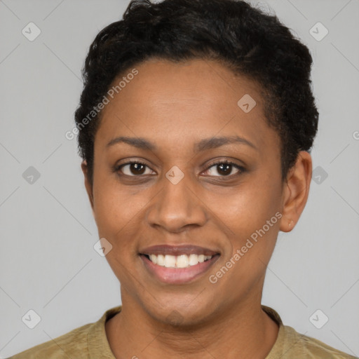 Joyful latino young-adult female with short  brown hair and brown eyes