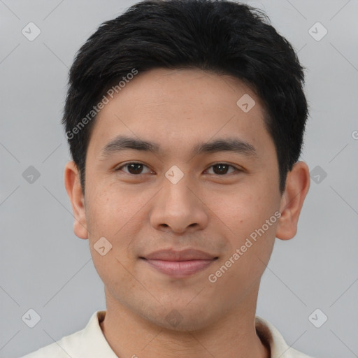 Joyful asian young-adult male with short  black hair and brown eyes