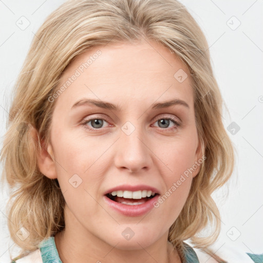 Joyful white young-adult female with medium  brown hair and blue eyes