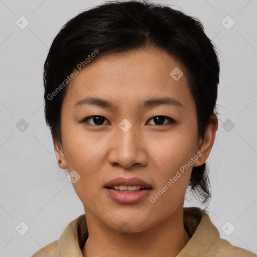 Joyful asian young-adult female with short  brown hair and brown eyes