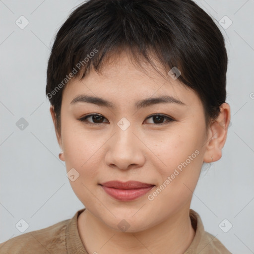 Joyful asian young-adult female with short  brown hair and brown eyes