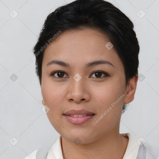 Joyful asian young-adult female with short  brown hair and brown eyes