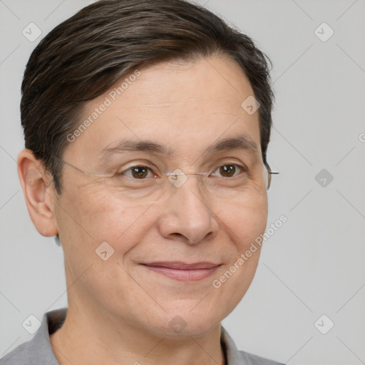 Joyful white adult female with short  brown hair and brown eyes