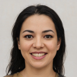 Joyful asian young-adult female with medium  brown hair and brown eyes