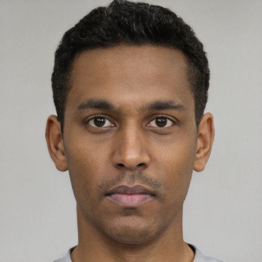 Neutral latino young-adult male with short  black hair and brown eyes