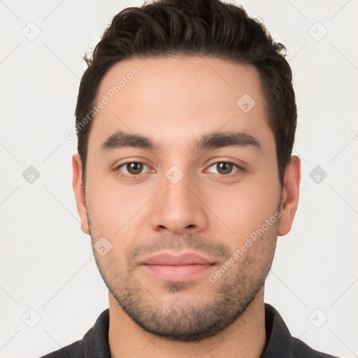 Neutral white young-adult male with short  brown hair and brown eyes