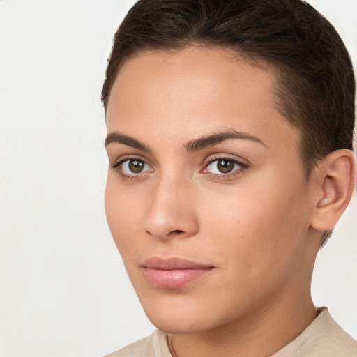 Neutral white young-adult female with short  brown hair and brown eyes