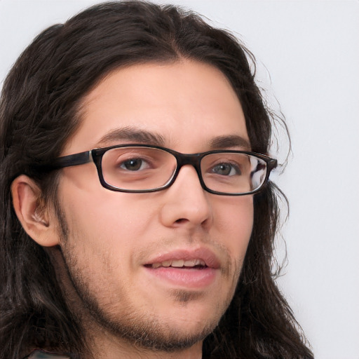 Neutral white young-adult male with long  brown hair and brown eyes