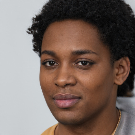 Neutral black young-adult female with short  black hair and brown eyes