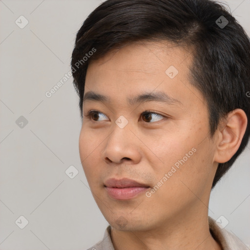 Neutral asian young-adult male with short  black hair and brown eyes