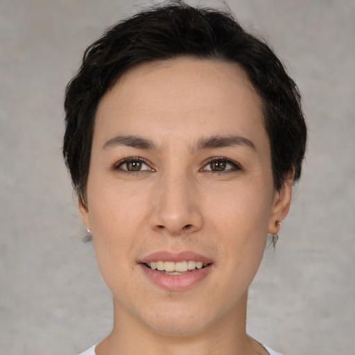 Joyful white young-adult female with short  brown hair and brown eyes